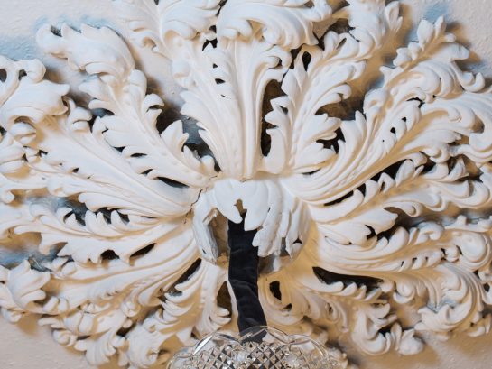 Hand-painted plaster ceiling light rose detail